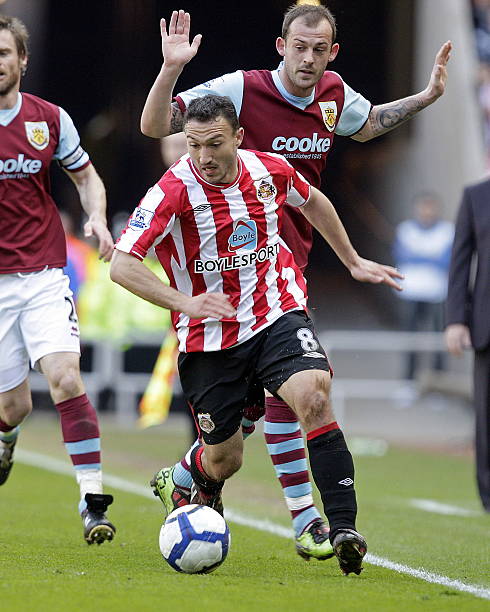 背后到底隐 背后到底隐